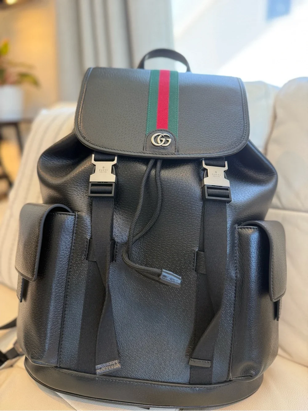 Used Black Leather Backpack with Signature Green-Red Stripe